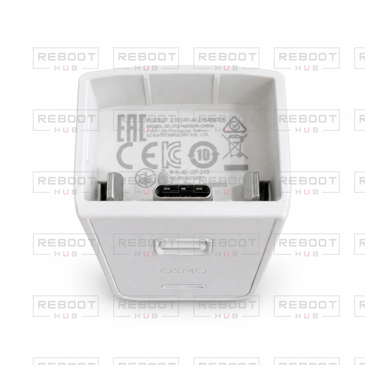 White DJI Pocket 2 Do-It-All Handle pre-owned connector cavity and label view with Reboot Hub watermark overlay
