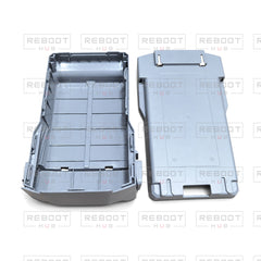 OEM-pulled DJI Mini 5 Pro Battery Cover on white with Reboot Hub watermark overlay