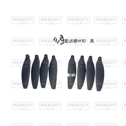 OEM-pulled DJI Mini 2 OEM Propeller Set on white with Reboot Hub watermark overlay — view 1