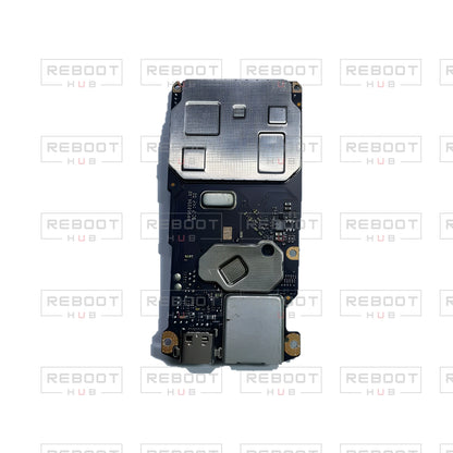 OEM-pulled DJI Mini SE Motherboard on white with Reboot Hub watermark overlay — view 1
