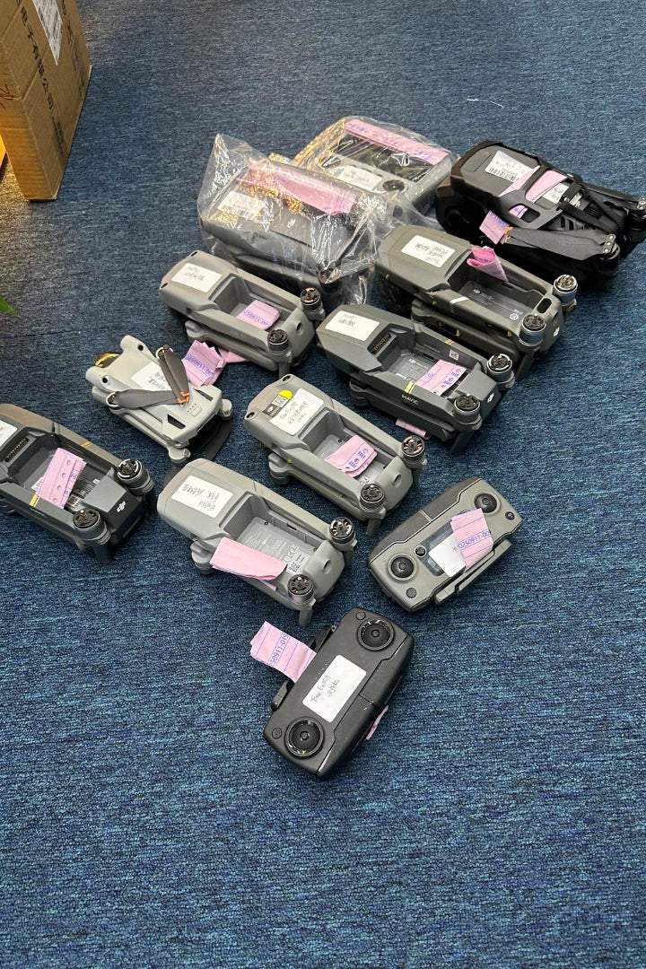 DJI drones and controllers grouped for Reboot Hub technical processing