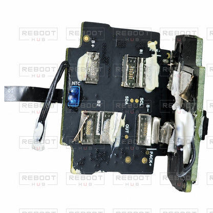 OEM-pulled DJI Air 2 Battery Motherboard on white with Reboot Hub watermark overlay — view 5