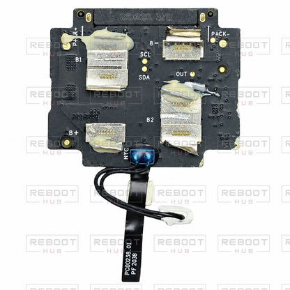 OEM-pulled DJI Air 2S Battery Motherboard on white with Reboot Hub watermark overlay — view 1