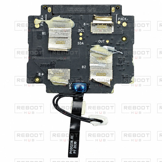 OEM-pulled DJI Air 2S Battery Motherboard on white with Reboot Hub watermark overlay — view 1