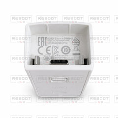 White DJI Pocket 2 Do-It-All Handle pre-owned connector cavity and label view with Reboot Hub watermark overlay