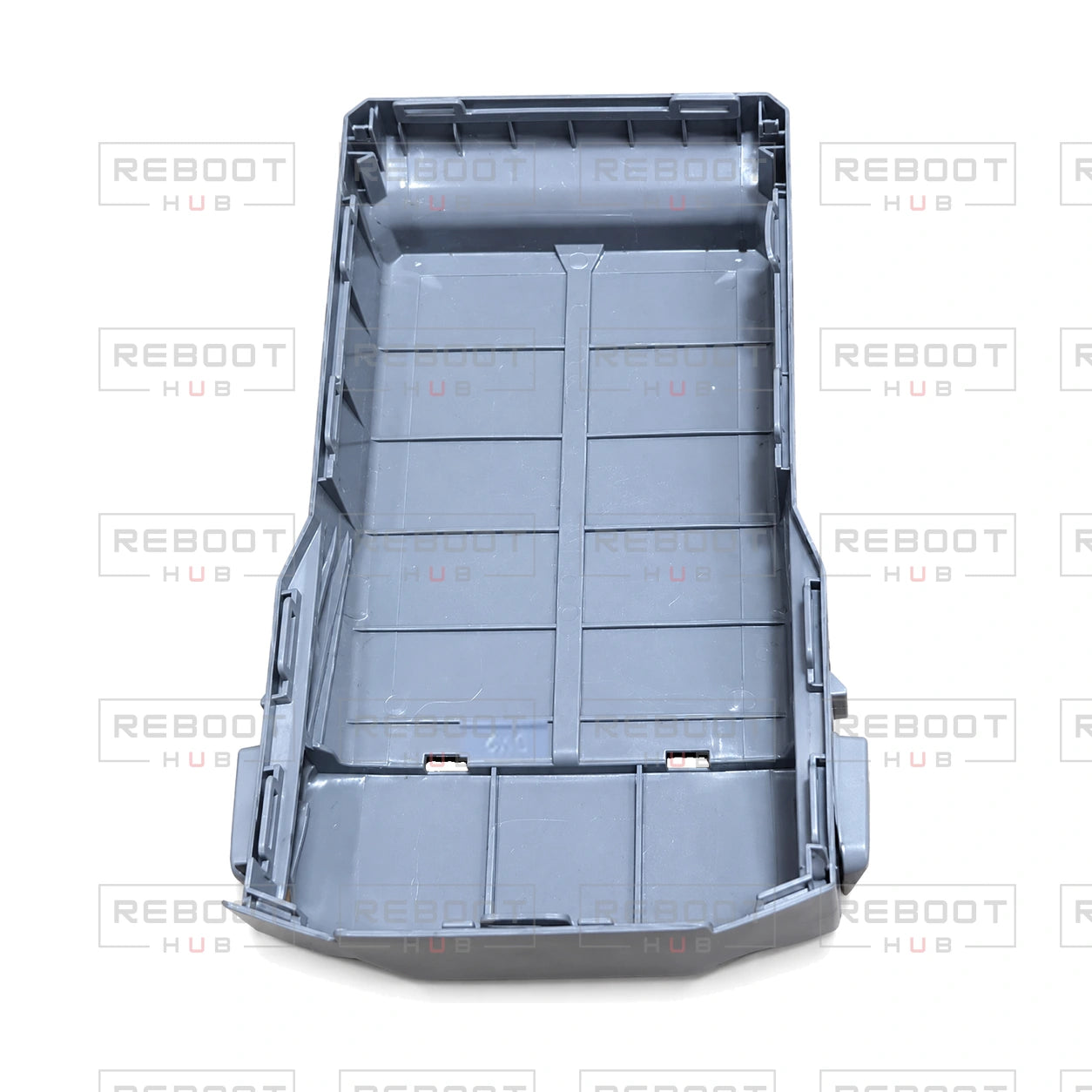 OEM-pulled DJI Mini 5 Pro Battery Cover on white with Reboot Hub watermark overlay