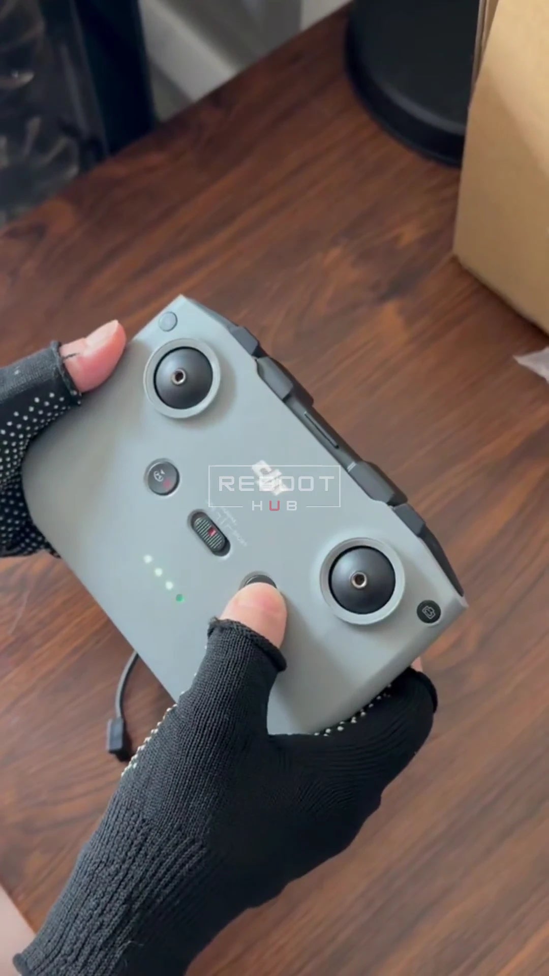 A Reboot Hub team member holding the RC-N1 before protective packing